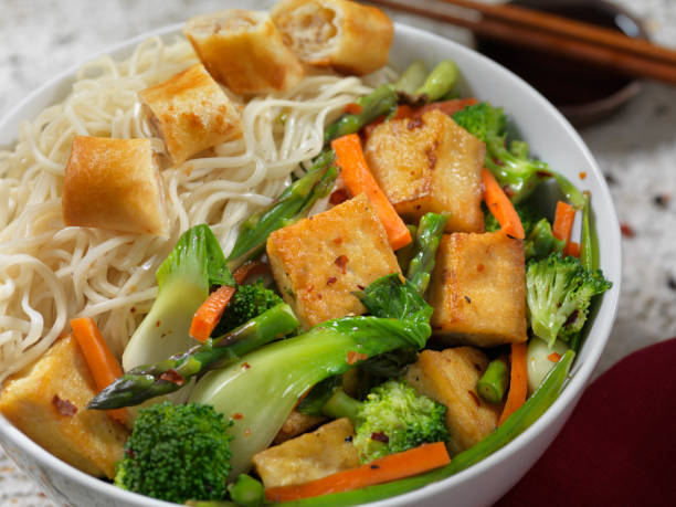 A colourful stir fried vegetables and tofu pieces